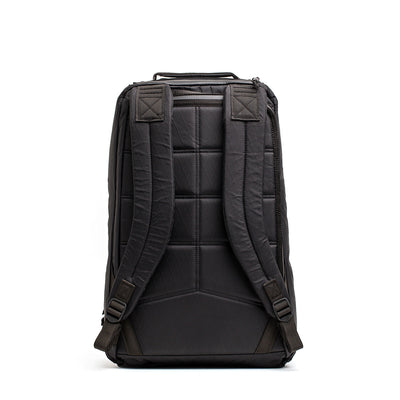 The GR1 USA - X-PAC is a black backpack featuring AquaGuard zippers, X-PAC material, padded straps, and a back panel for comfort while standing upright.