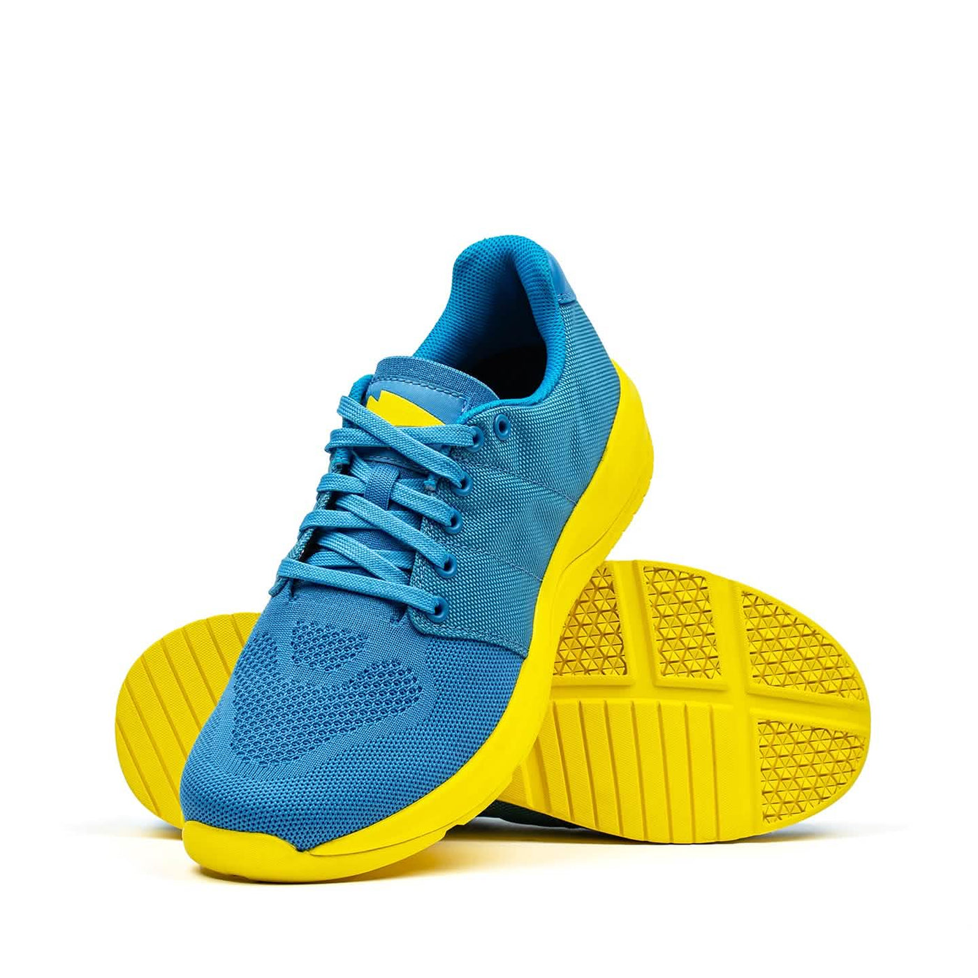 The Ballistic Trainers - Blue + Yellow feature durable CORDURA® Ballistic Nylon and yellow soles, with one shoe upright and the other showing the sole—ideal functional fitness footwear with 3X Support™.