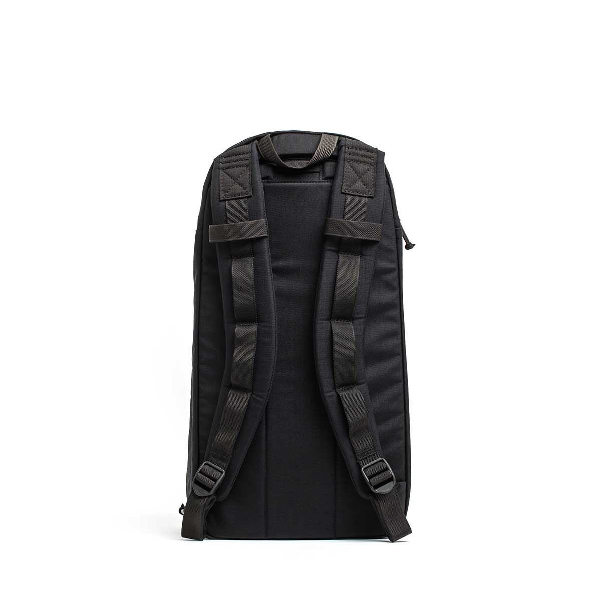 The Bullet Ruck USA Throwback, a black daypack with padded shoulder straps, back panel, and durable CORDURA construction, stands upright against a white background.