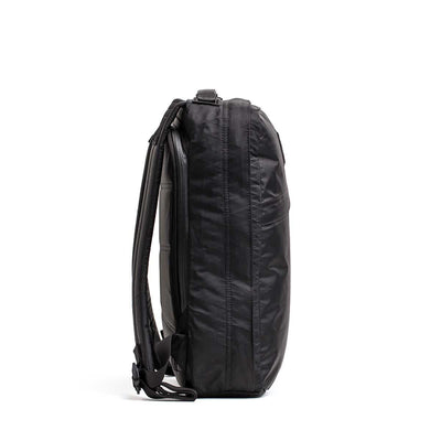 The GR0 - X-PAC waterproof black backpack is displayed upright from the side on a white background.