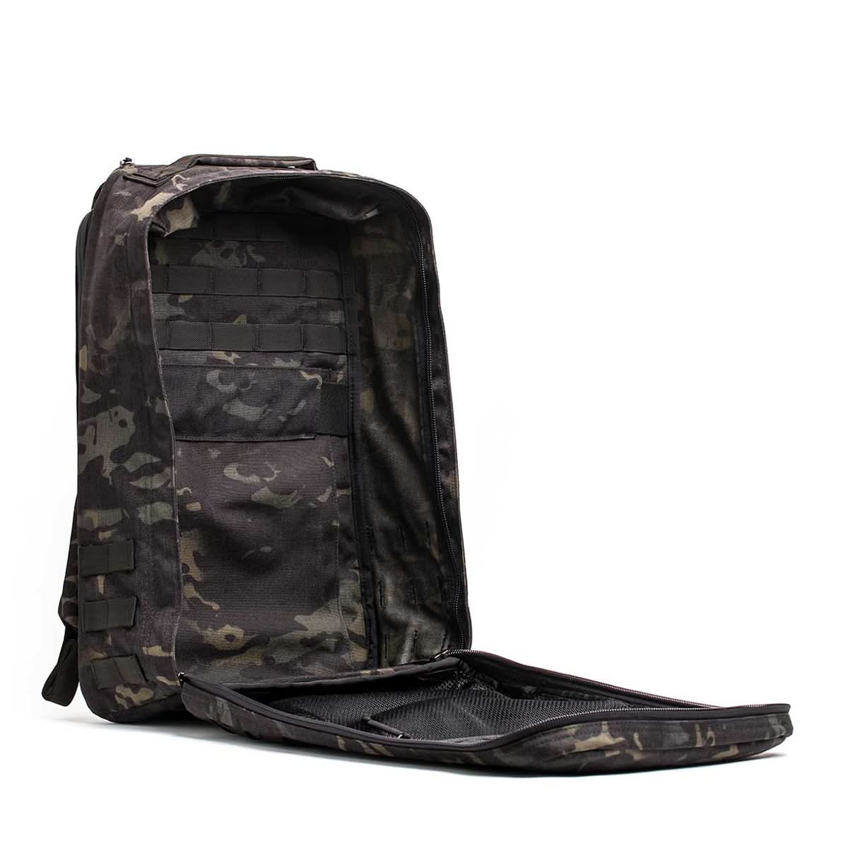 The GR1 USA - Cordura (The Original Ruck) is a black camo backpack made with Special Forces-grade materials, featuring a spacious interior with well-designed pockets and compartments—ideal for the GORUCK Challenge.