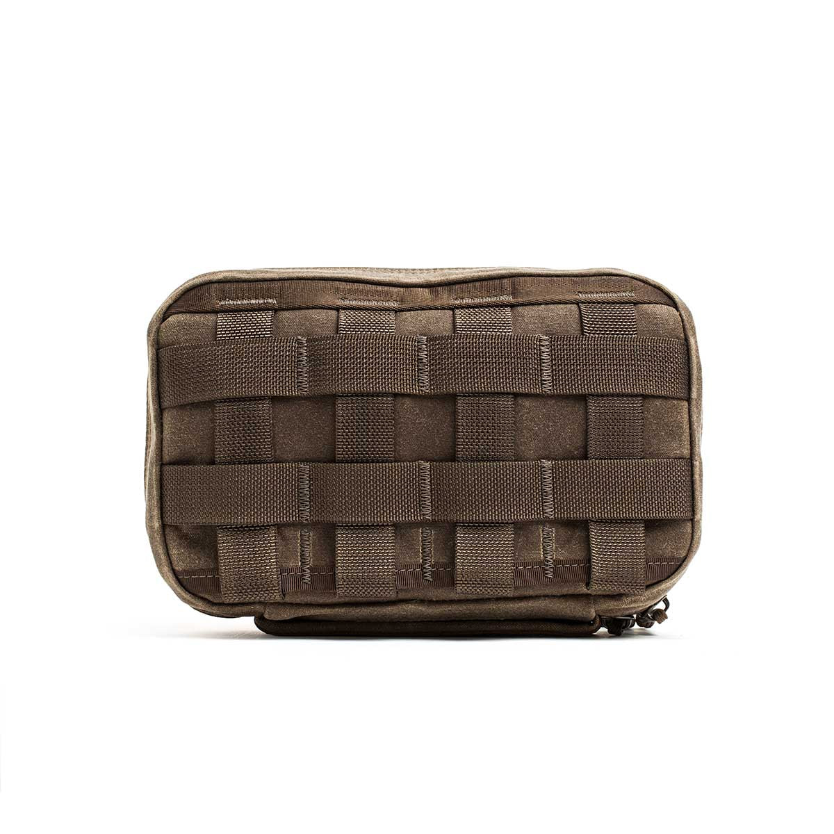 The GR1 Field Pocket - Waxed Canvas is a brown pouch crafted from durable waxed canvas with woven MOLLE webbing on the front, shown against a white background.