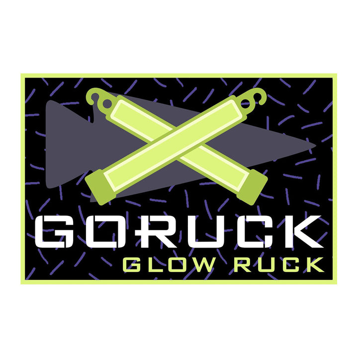 Patch - Glow Ruck: Features two crossed glow sticks, a dark arrow, and "GORUCK Glow Ruck" text on a patterned background—ideal for night rucking or showing GORUCK Club pride.