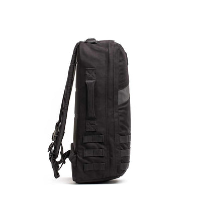 A side view of a black GORUCK Rucker 4.0 featuring multiple compartments, straps, and loops for attachments. Its sleek and minimalist design is ideal for rucking enthusiasts who prioritize functionality and durability.