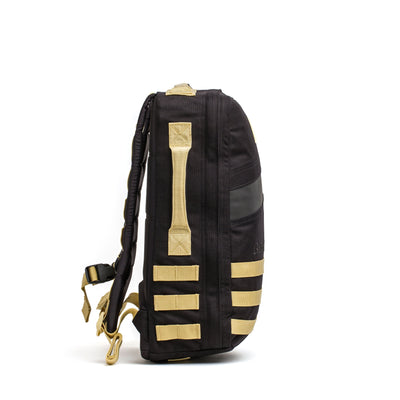 The GORUCK Rucker 4.0, in black and beige, is shown from the side against a white background.