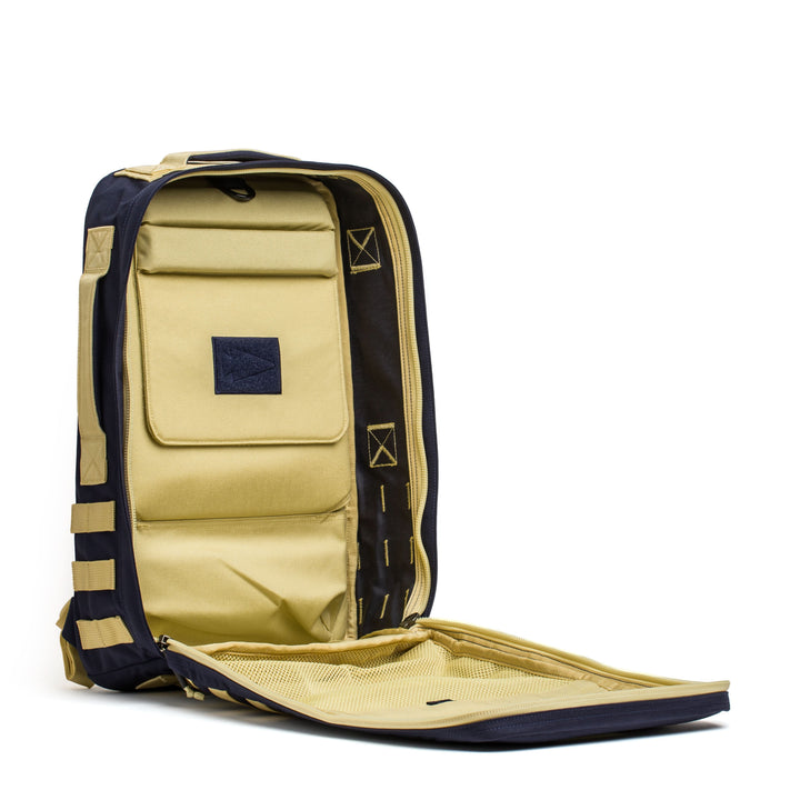 Discover the GORUCK Rucker 4.0, a yellow and black rucksack featuring multiple compartments and a mesh pocket, ideal for any rucking adventures.