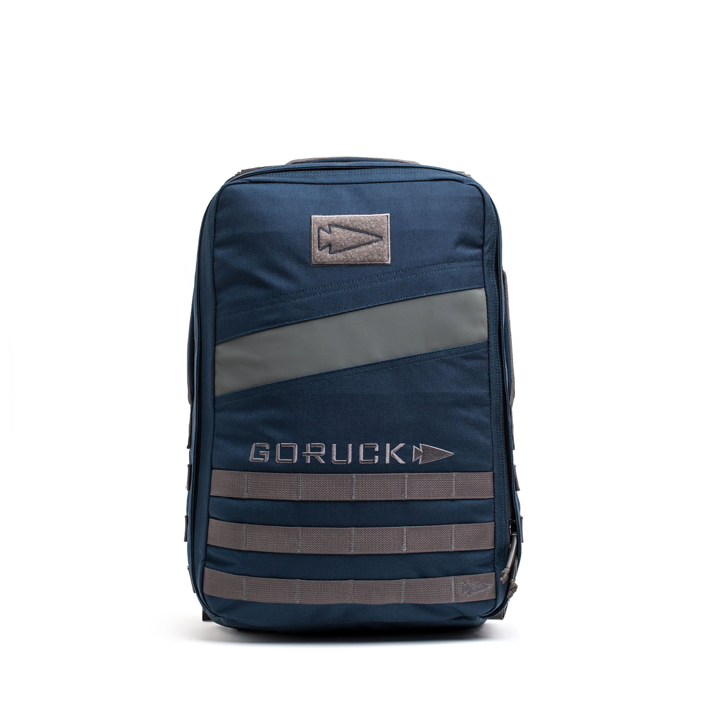 The navy blue Rucker 4.0 backpack with gray accents and logo features a dedicated Ruck Plate compartment, shown standing upright on a white background.