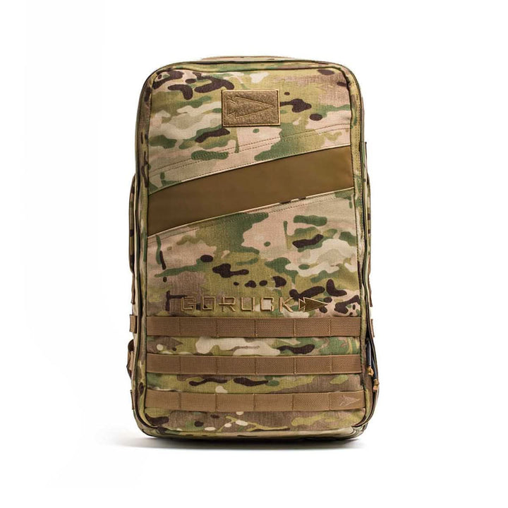 The Rucker 4.0 is a camouflage tactical rucksack featuring MOLLE webbing and a front velcro patch, ideal for rucking or carrying ruck plates.