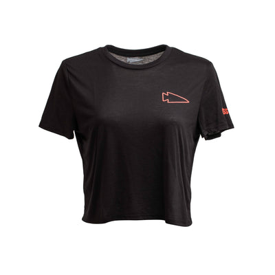 The GORUCK Women's Subtle Spearhead x CrossFit Cropped Tee is crafted from a premium poly-blend, featuring a small red arrowhead logo on the upper left chest and a red SS on the right sleeve, perfect for your workout wardrobe.