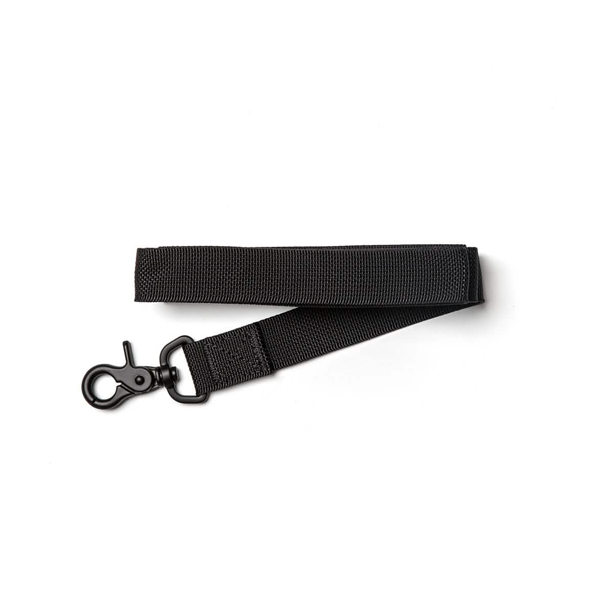A Small Dog Leash from GORUCK, crafted from durable, military-grade nylon in a sleek black color, featuring a secure swivel hook clip on one end, is laid flat on a white background.