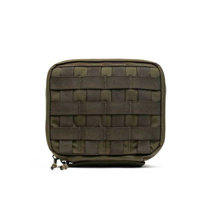 Introducing the GORUCK GR2 Field Pocket, a compact, olive green tactical pouch expertly crafted from rugged 1000D Cordura. This square pouch showcases MOLLE webbing on the front and includes dual zipper pulls at the bottom, making it perfect for organizing electronics or carrying essential gear.