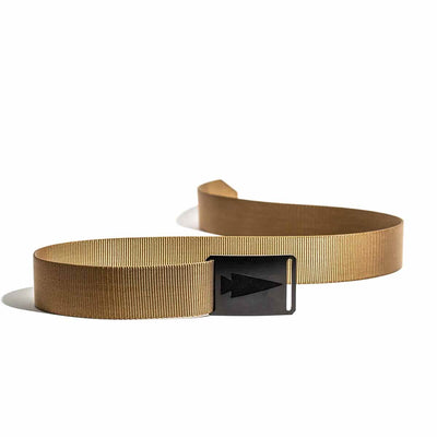 A tan Spearhead Tactical Belt by Grip 6 features a black, rectangular buckle adorned with a simplistic arrow design. Its durable construction makes it ideal for endurance events. The belt is neatly coiled with the buckle facing outward against a white background.