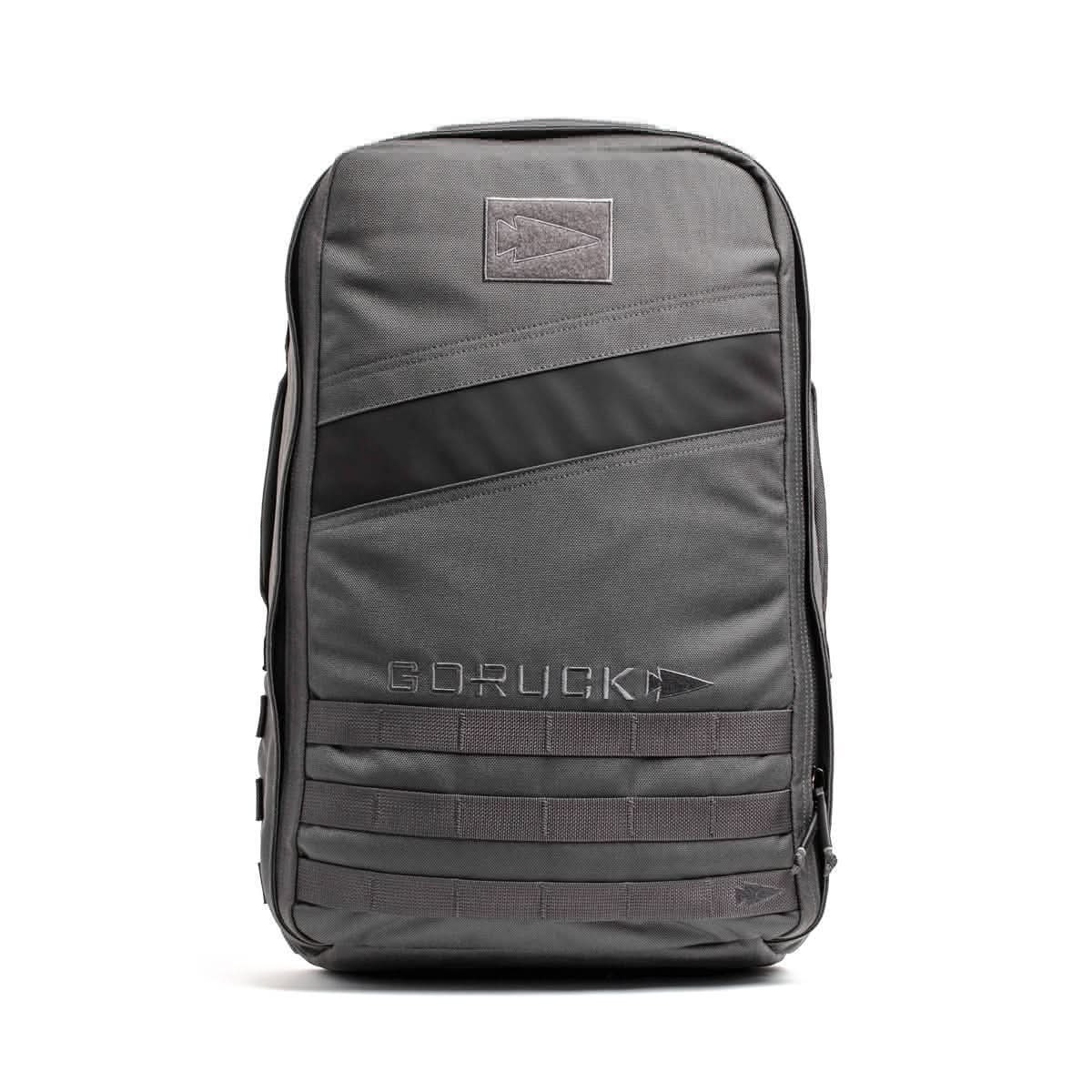 The Rucker 4.0 in gray with a black diagonal stripe is perfect for fitness enthusiasts, featuring multiple pockets and "GORUCK" on the front, making it ideal for rucking adventures.