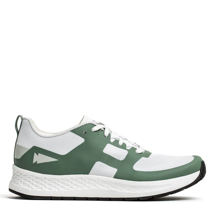 Introducing the Women's Rough Runner - Seaspray by GORUCK: a green and white athletic shoe designed with a geometric pattern and lightweight features for high mileage running. It showcases green overlays on a white base, a black outsole, and a sleek logo, accompanied by a Gradient Density EVA Midsole to ensure optimal comfort and performance.
