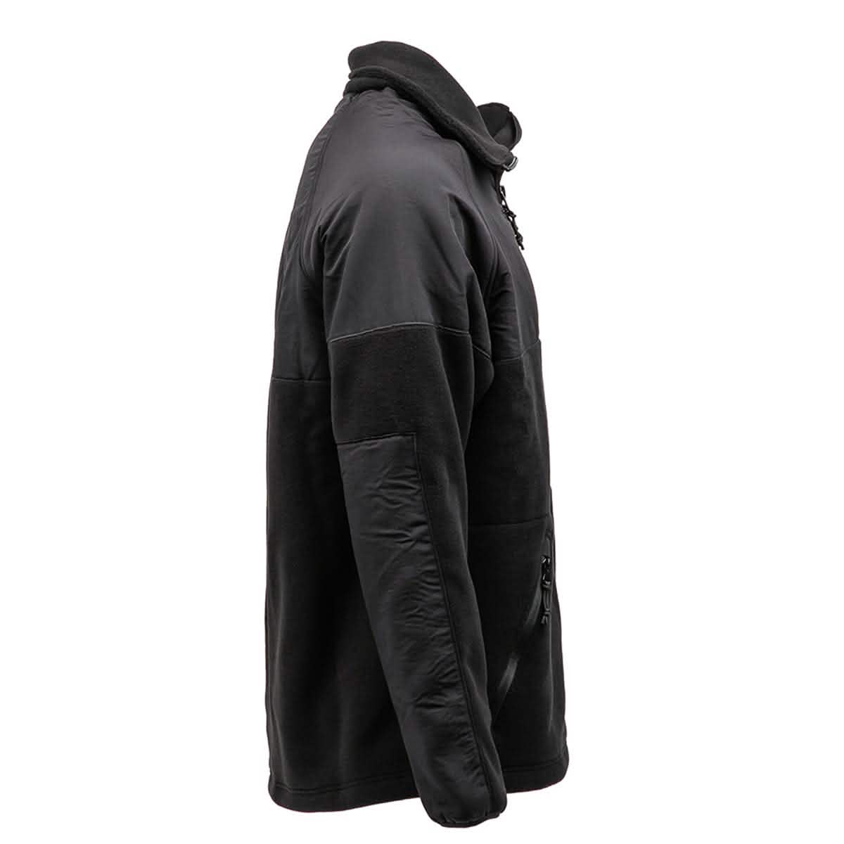 A side view of the Men’s Task Force Dagger Jacket by GORUCK, crafted with black Polartec fleece. This jacket features a high collar, a zippered front pocket, and a combination of smooth and textured fabric panels that evoke the rugged style of the 5th Special Forces Group.